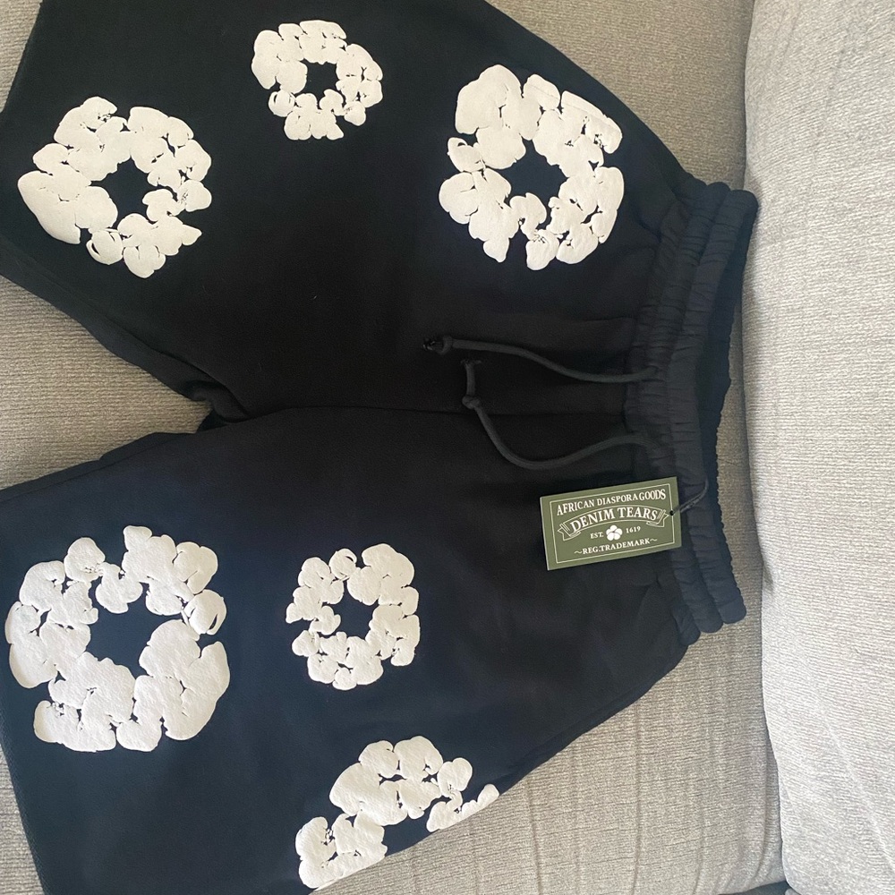 Denim Tears Black Shorts with White Floral Design
